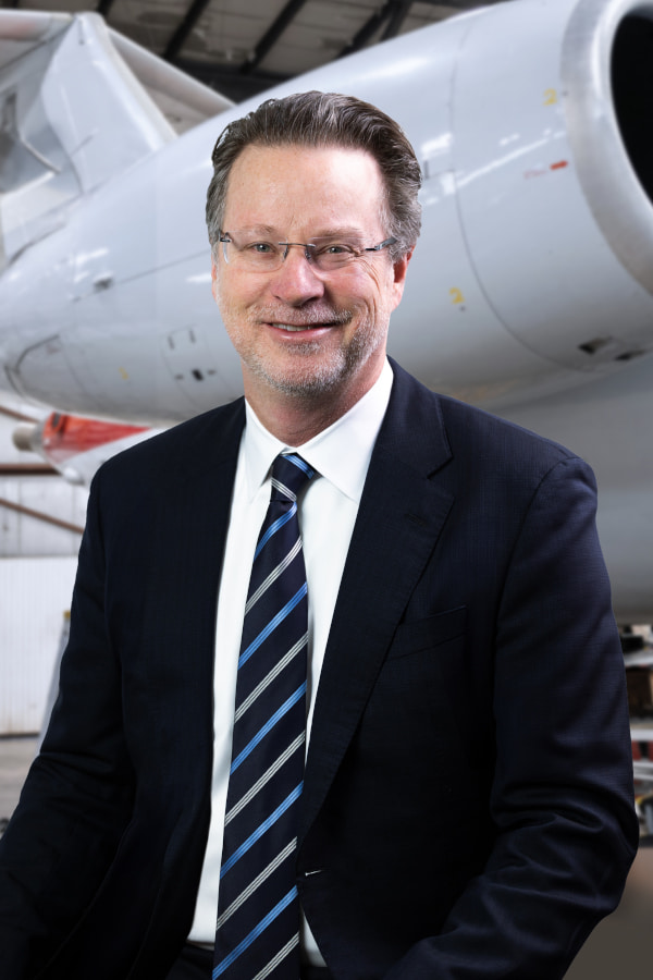 Joel A. English, President